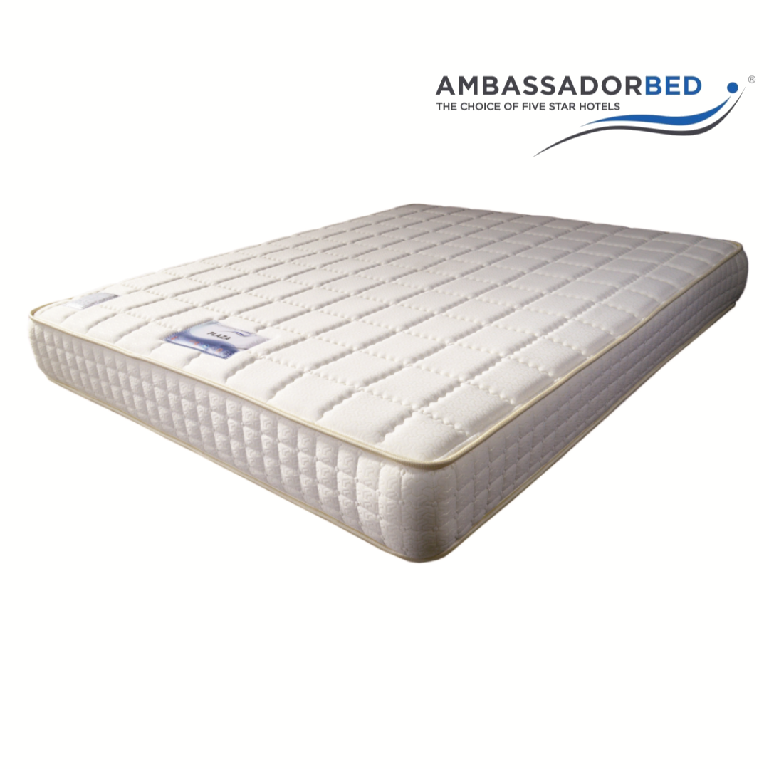Mattress with quilted white top and gray side panels, AmbassadorBed logo