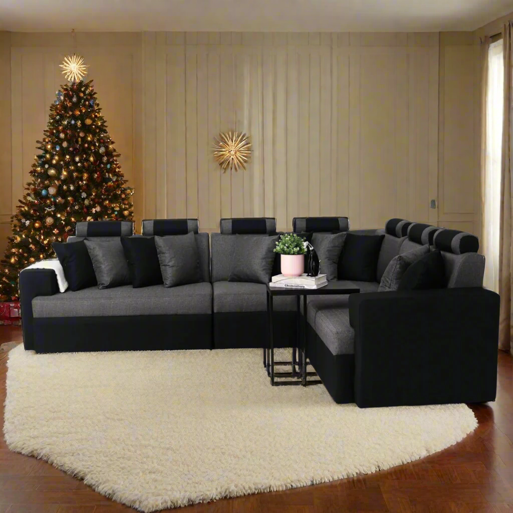 L-shape sectional sofa in gray fabric with black accents and chaise corner