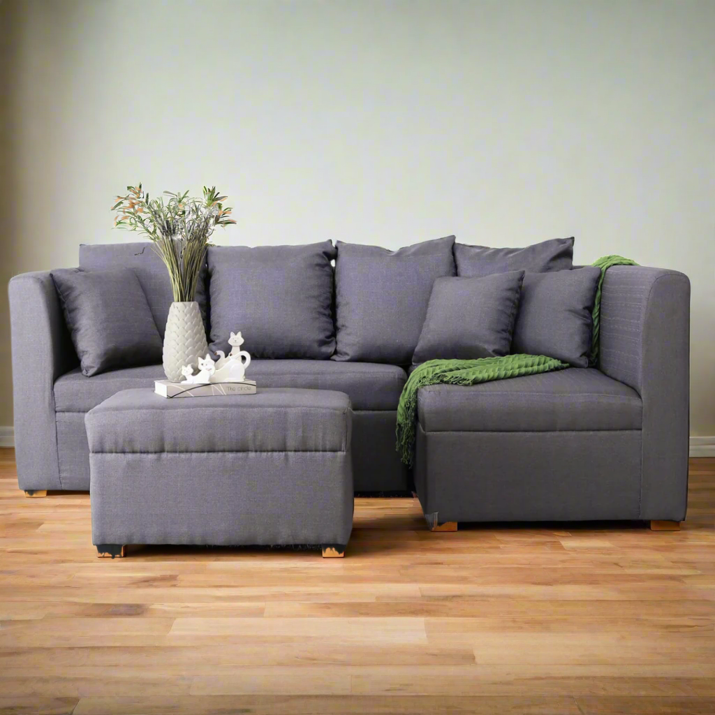 Gray L-shaped sectional sofa with left chaise ottoman and two seat back cushions