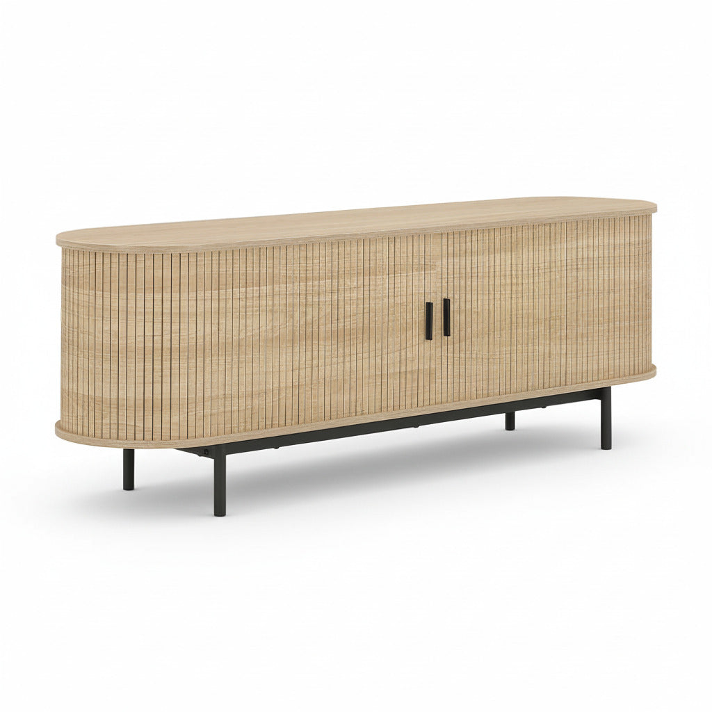 Light wood TV cabinet with ribbed cabinet doors, two black bar pulls, and four legs