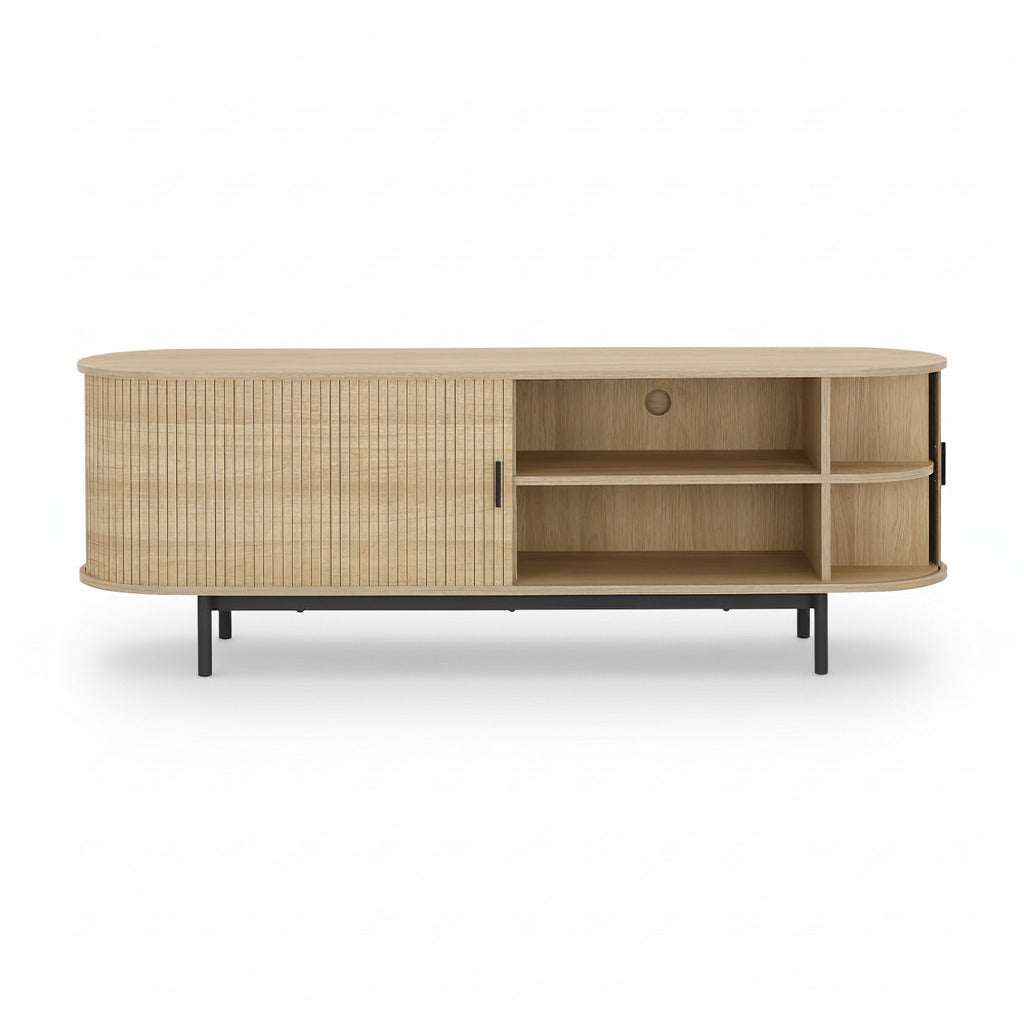 Light wood TV cabinet with open shelving on one side and a ribbed cabinet door