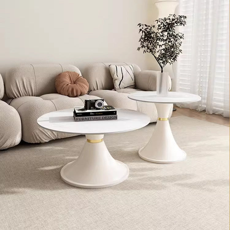 BIANCO round center table set with white pedestal bases and gold accent rings