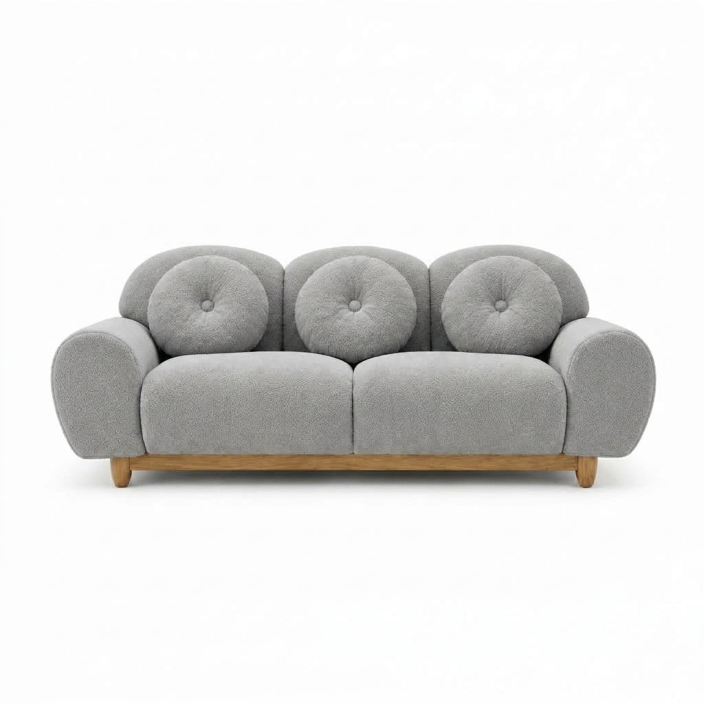 3-seater sofa with light gray tufted back, rounded arms, and wooden legs