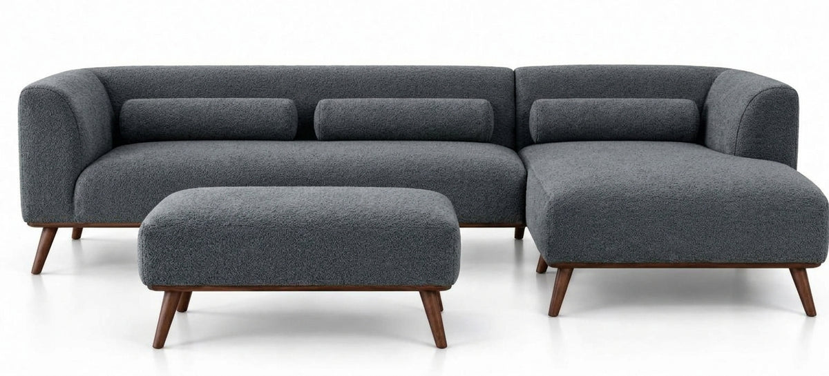 Gray L-shape sectional sofa with ottoman chaise and rounded seat cushions