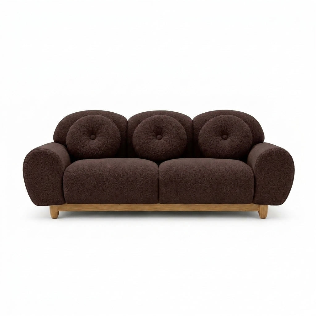 3-seater sofa with dark brown tufted back and rounded arms, wooden legs