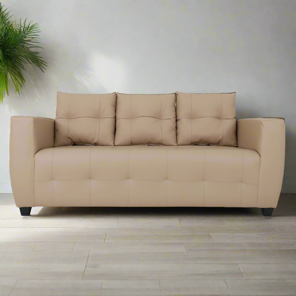 Beige 3-seat sofa with three back cushions and tufted seat, padded arms, dark legs