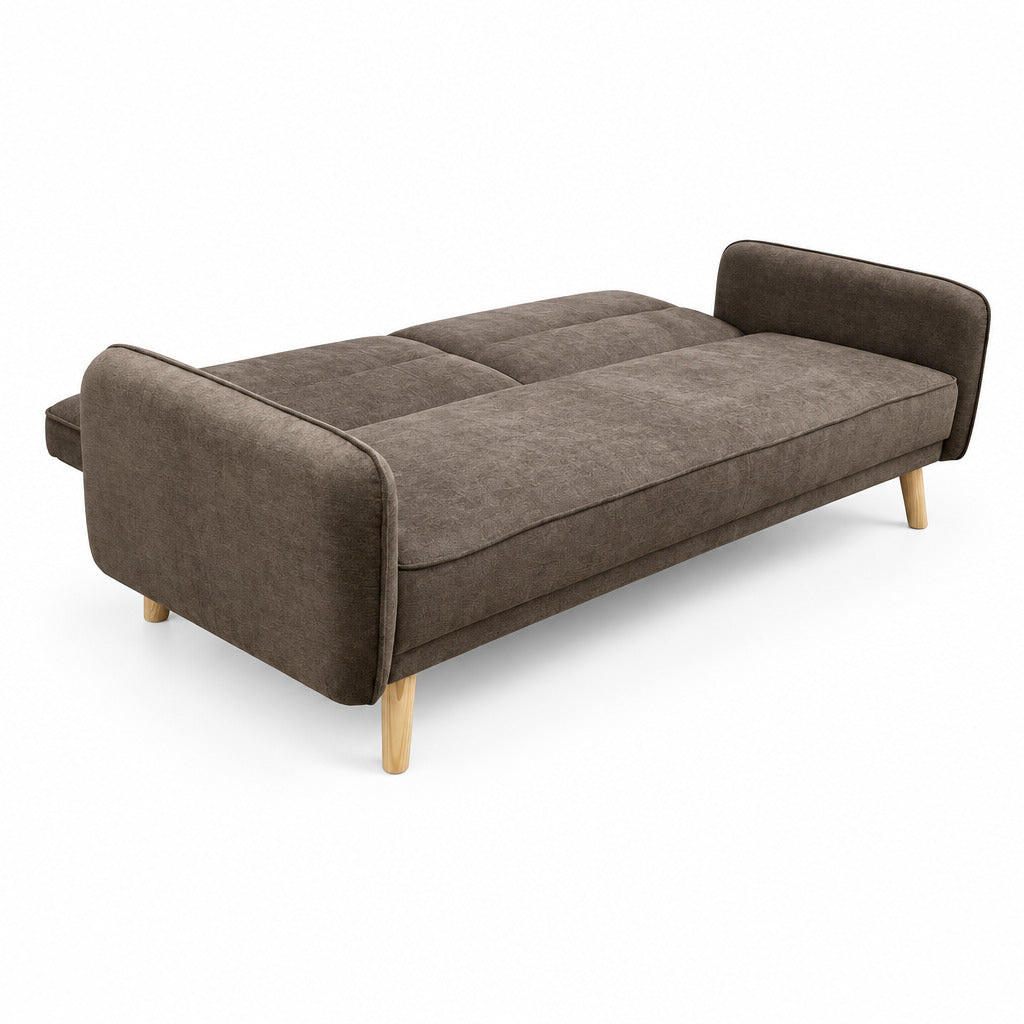 Gray sofa bed opened into a bed with two-piece mattress, padded arms, wooden legs