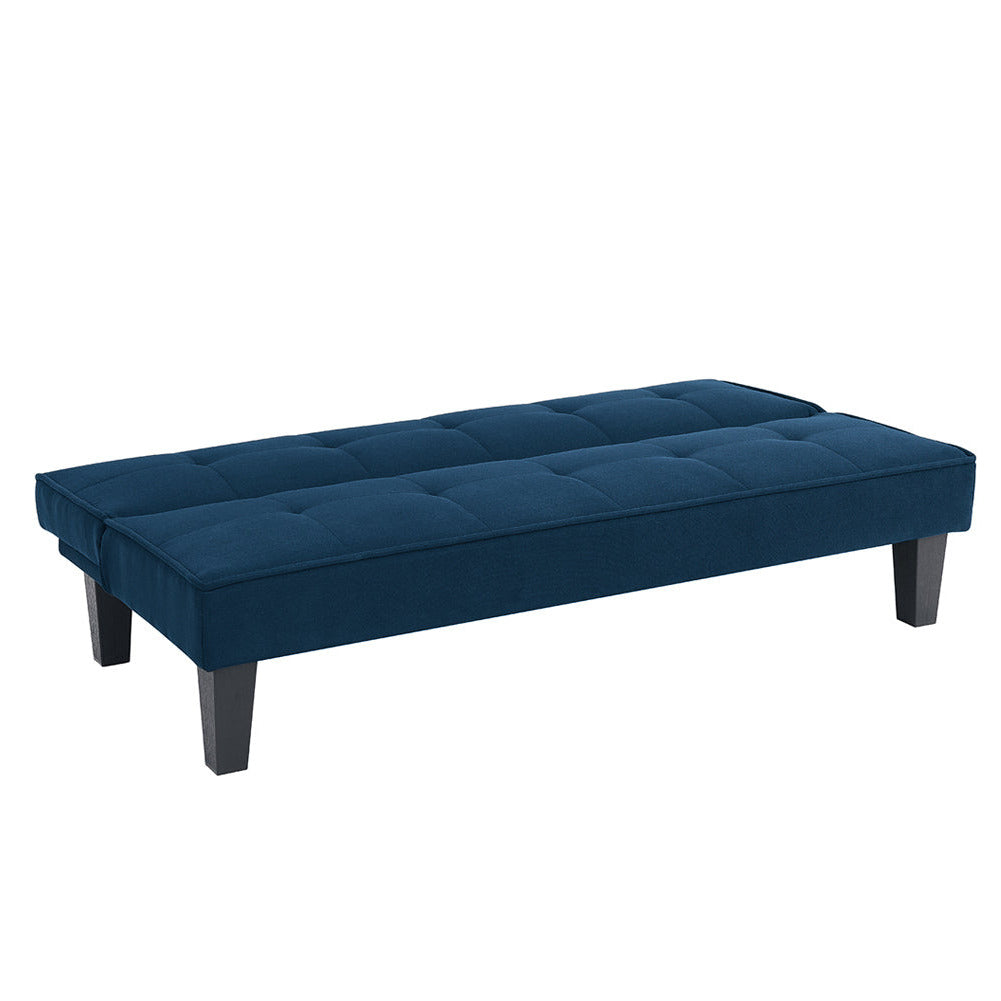 Blue sofa bed laid open as a bed, quilted mattress top and dark legs