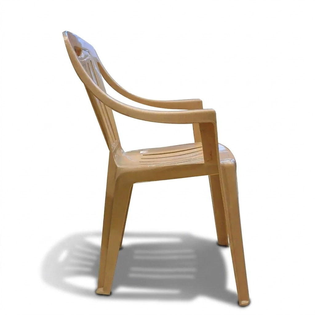 Light tan armchair side view with slatted back, curved armrests, solid seat