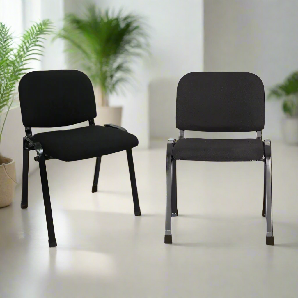 Set of 2 black visitors chairs with padded seats and backs on metal frames