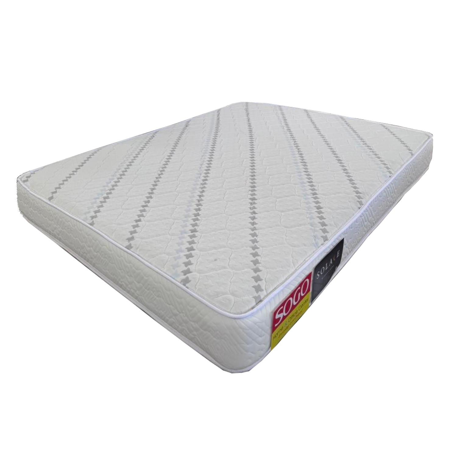 Quilted mattress top view, light cream with repeating diagonal stitch lines