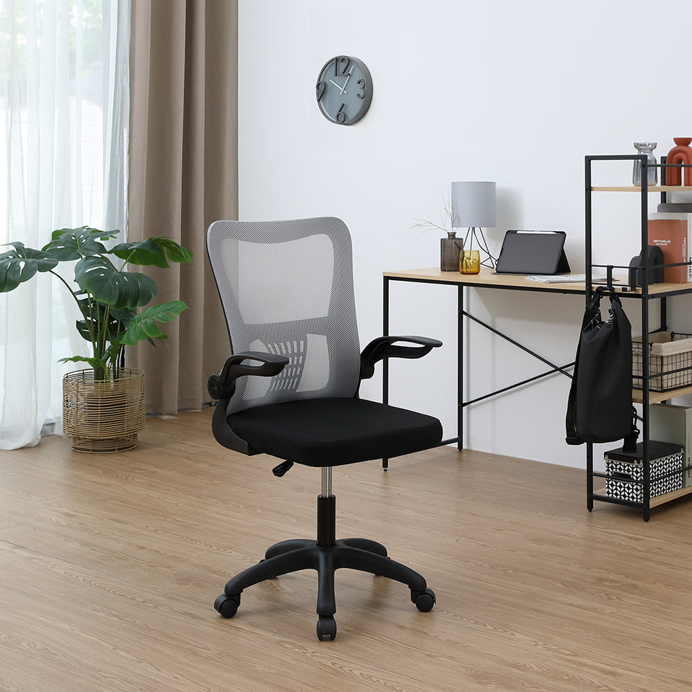 Office chair in gray mesh with black seat, armrests, and five-point rolling base.