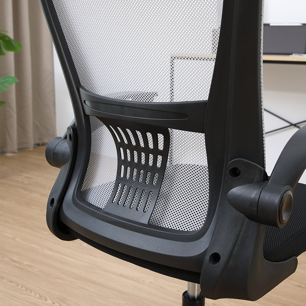Office chair armrest and gray mesh back with vented support panel.