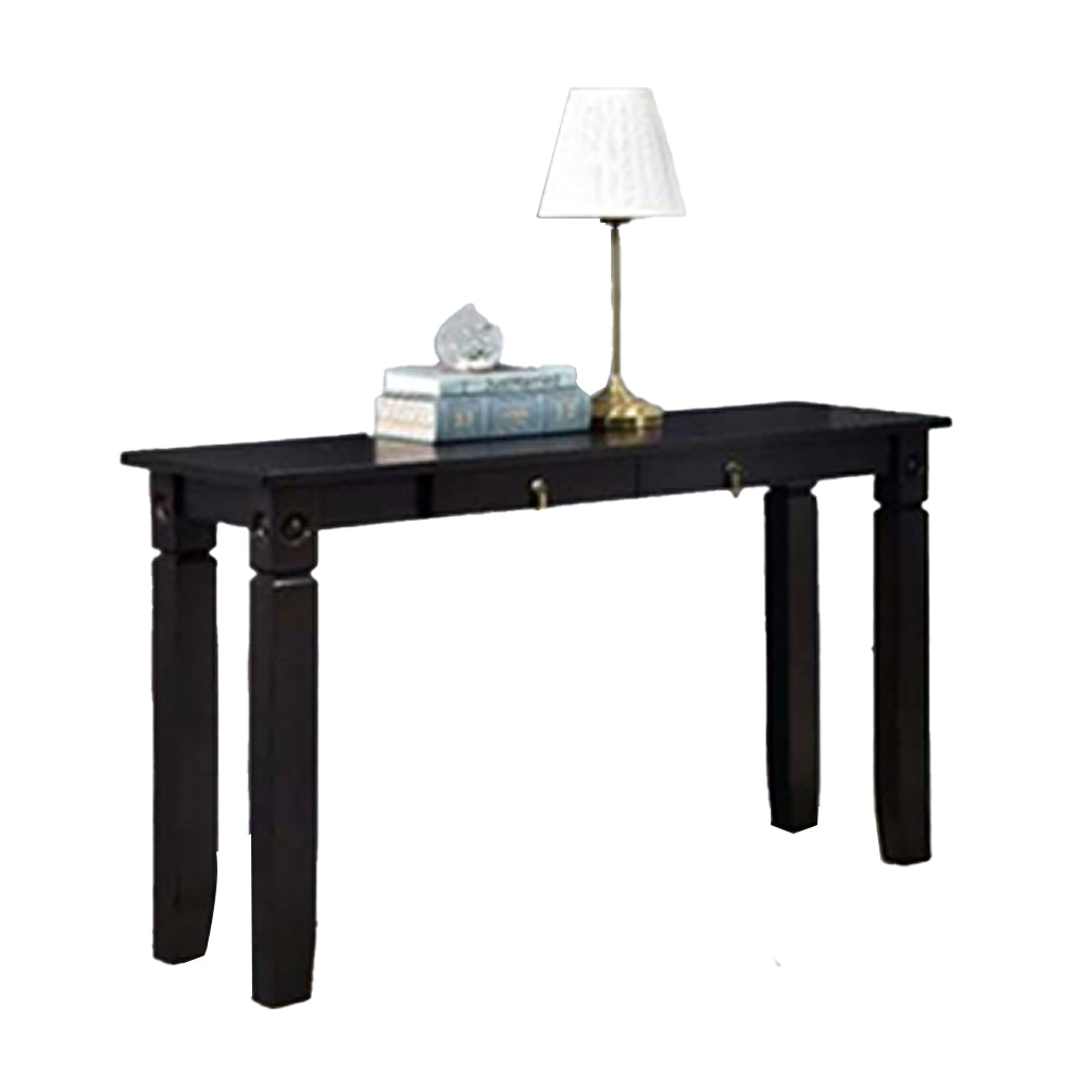 Dark console table with rectangular top, tapered legs, and drawer-style pulls; lamp.
