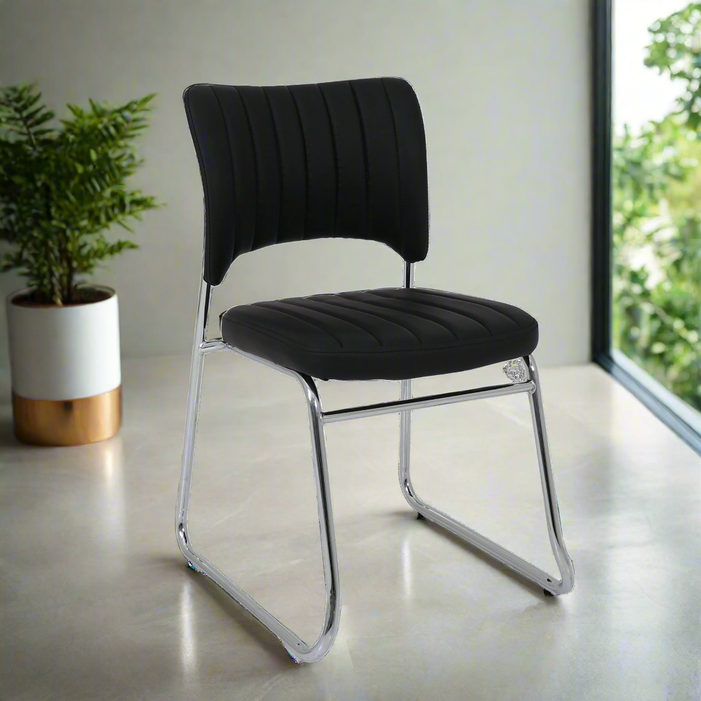 Visitor chair with black upholstered back and seat, chrome legs, cantilever base