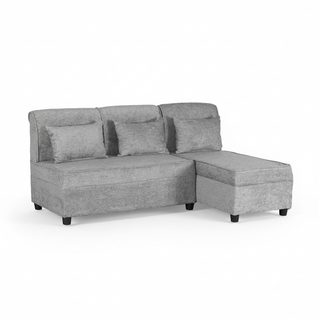 Grey L-shape sofa with chaise and padded arms, three back cushions