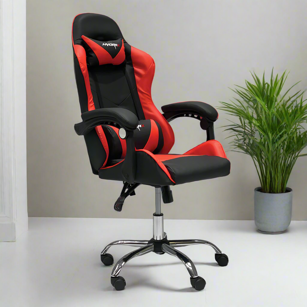 Gaming chair with red and black upholstery, armrests and star base in a room