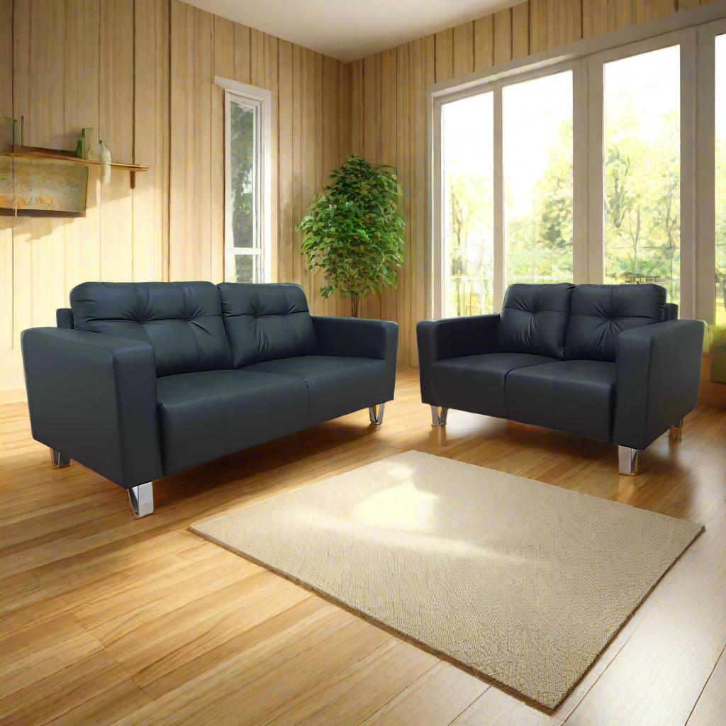 3-seater sofa with tufted back, padded arms, and box cushions in dark upholstery