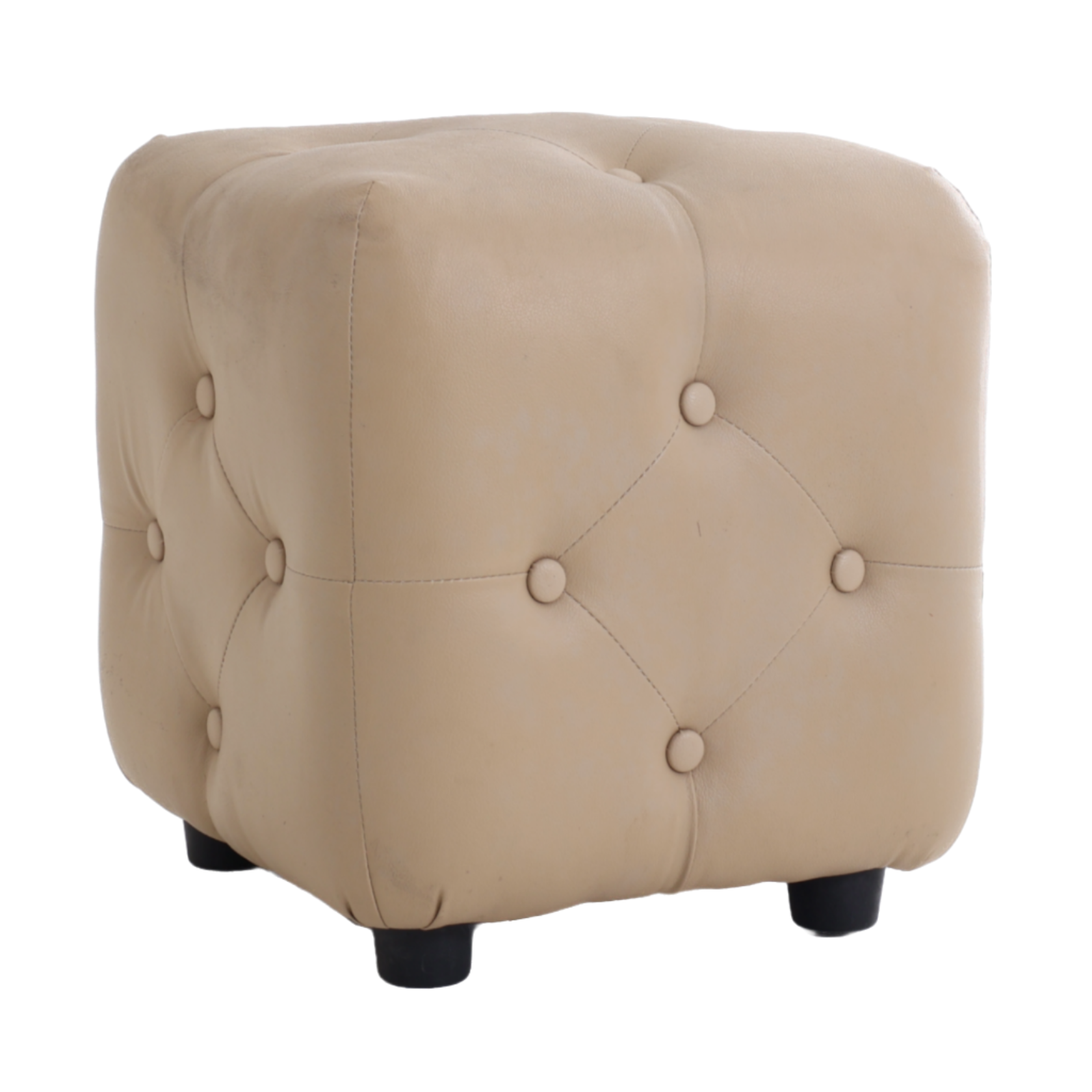 Beige leather tufted ottoman with button stitching, rounded top, and short dark feet