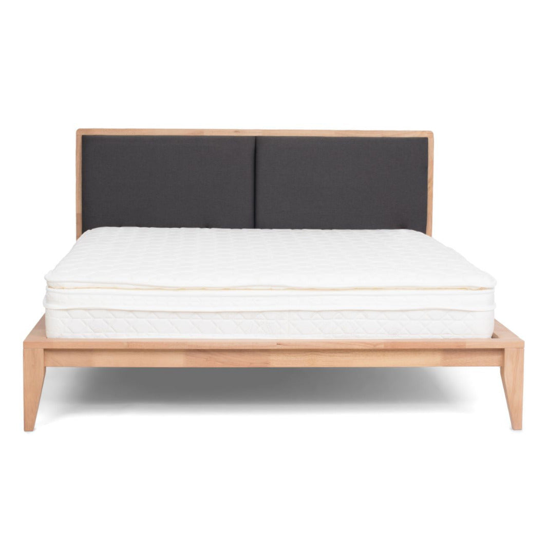 SINCLAIRE queen bed with light wood frame, charcoal upholstered headboard and white mattress