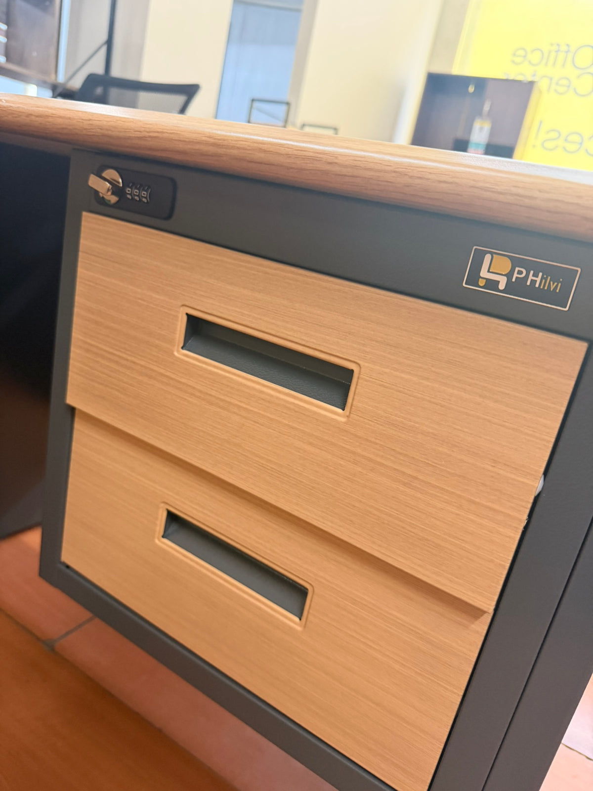 Vance Study Desk drawer close-up with two wood fronts and black inset handles