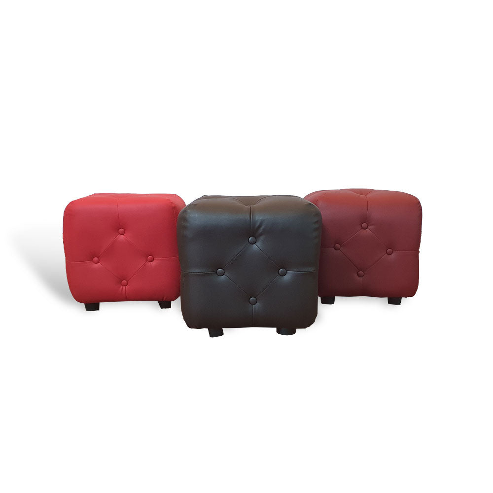 Leather ottoman set of 3: red, dark brown, and red cubes with button tufting and feet