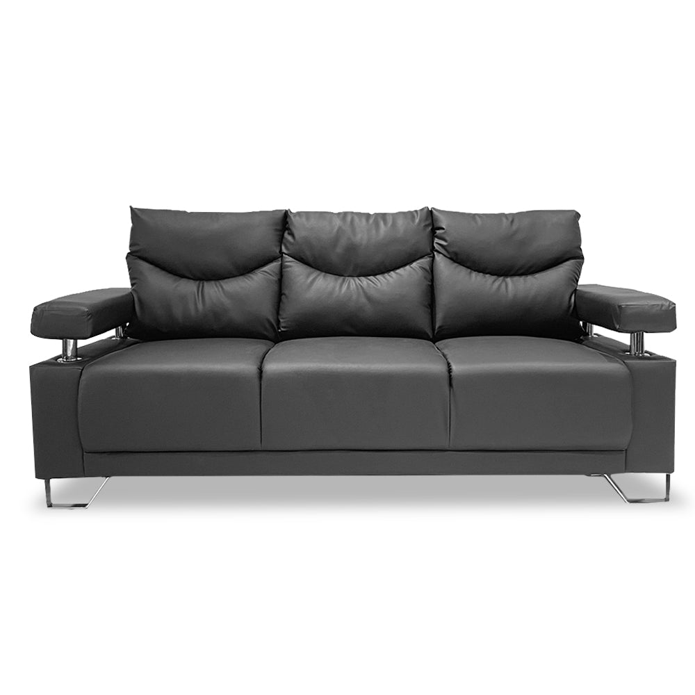 Dark sofa with tufted back, split back cushions, and chrome legs