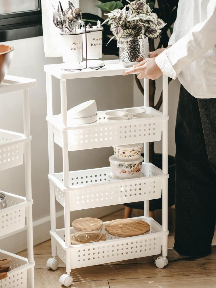 White 4-tier storage trolley with perforated shelves and four caster wheels
