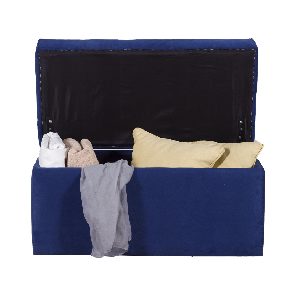 Blue fabric storage ottoman open to dark interior with beige and white items