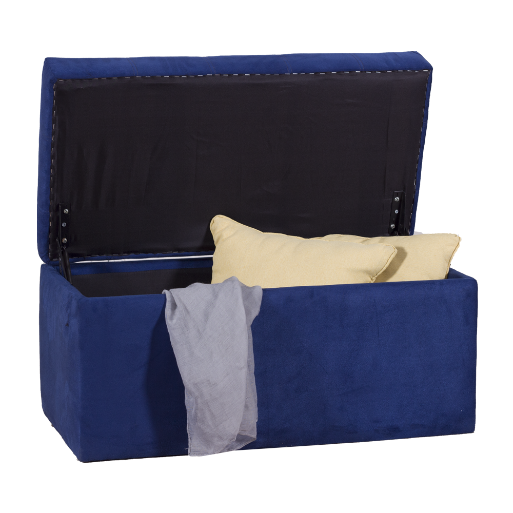 Blue fabric storage ottoman open lid with beige pillows and gray cloth inside