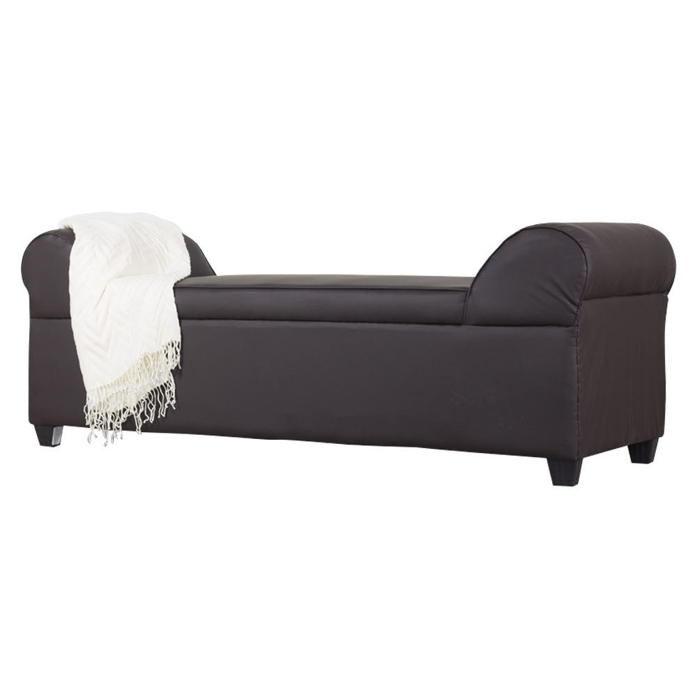 Lounge sofa with dark upholstery and rounded arms, with white throw blanket on left side