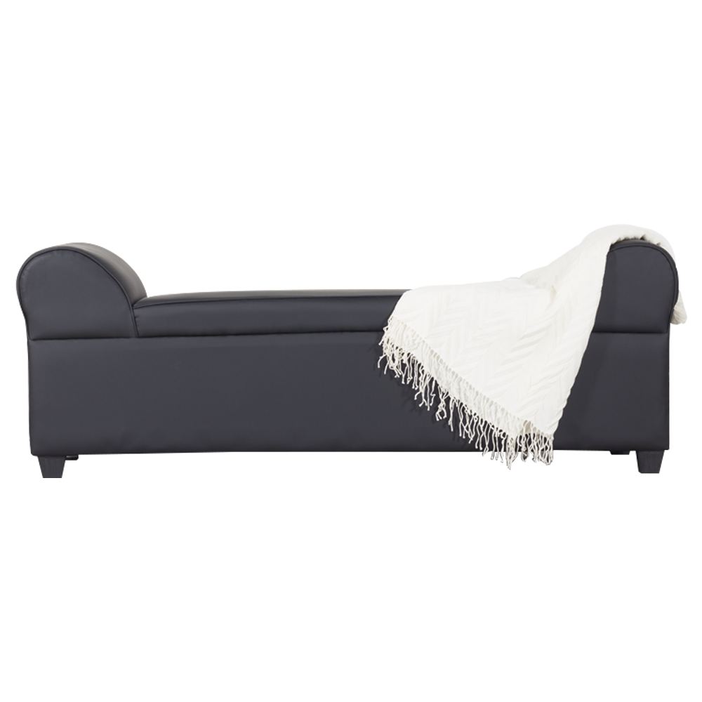 Lounge sofa with curved back, dark upholstery, and white throw blanket on right arm