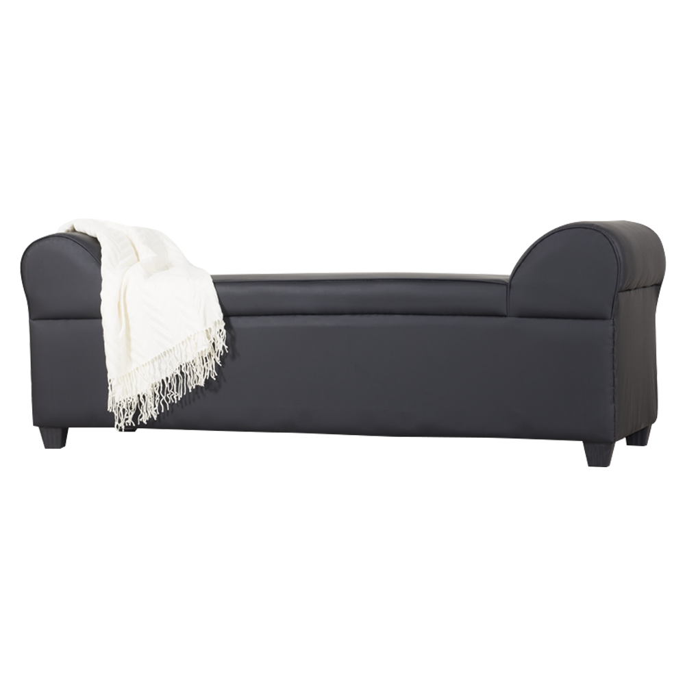 Lounge sofa with rounded ends, dark upholstery, and white throw blanket draped on seat