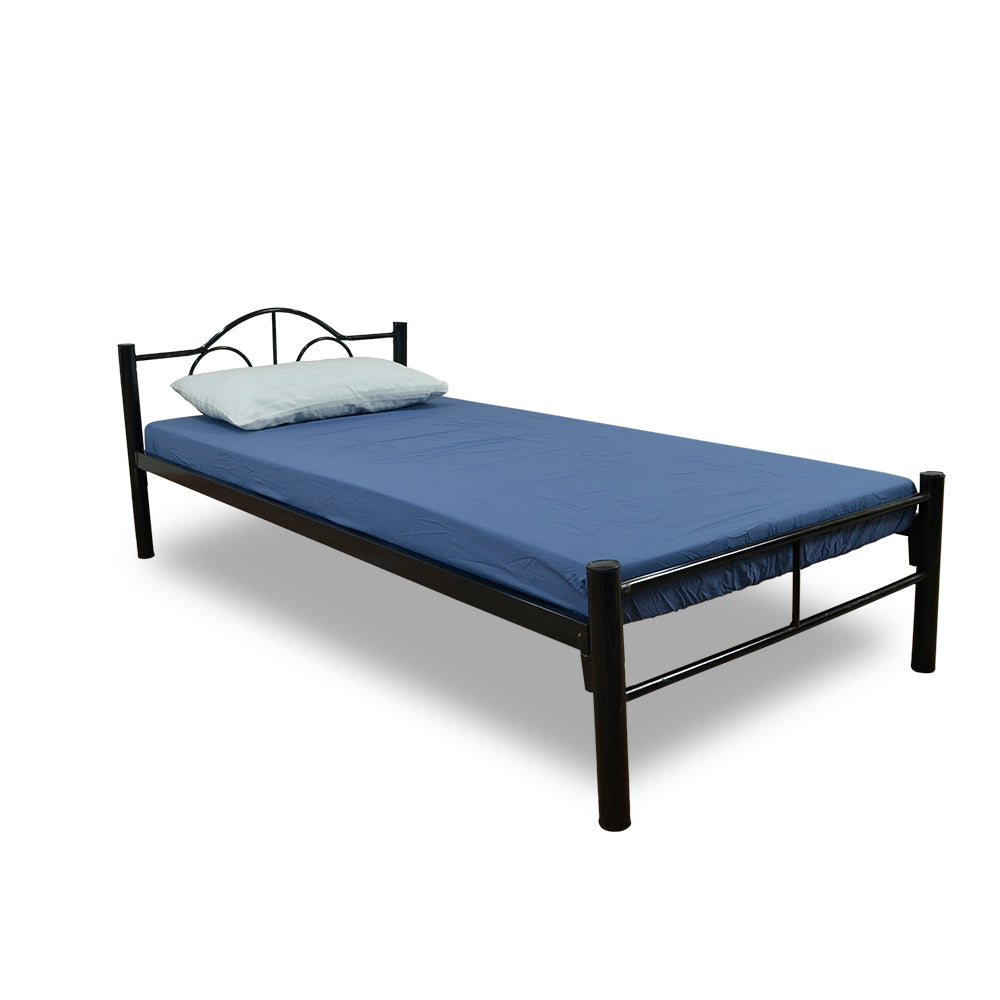 Single bed with blue bedding and light gray pillow on a dark metal frame.