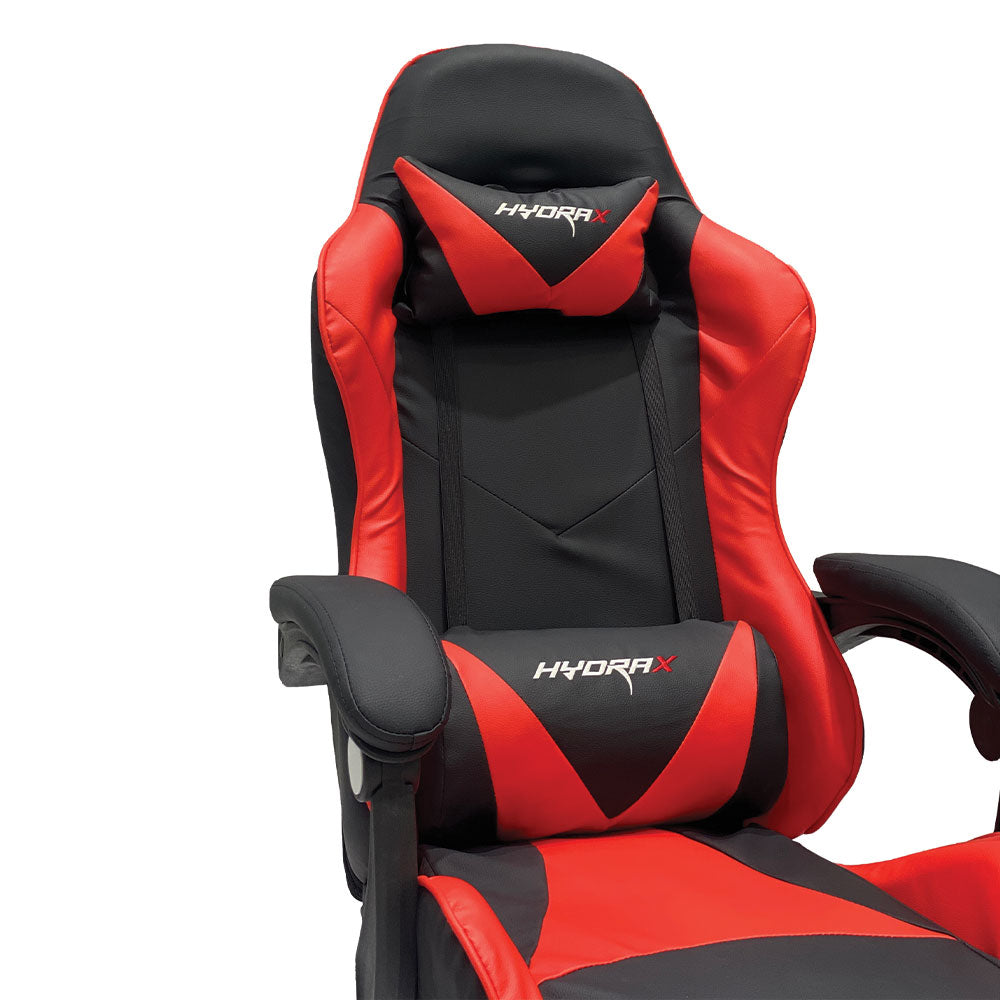Gaming chair with red and black backrest and headrest, side view of armrests