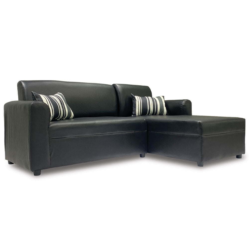 Black L-shape sofa with striped throw pillows