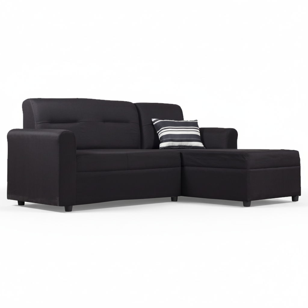 Black L-shape sofa with striped pillow on right chaise