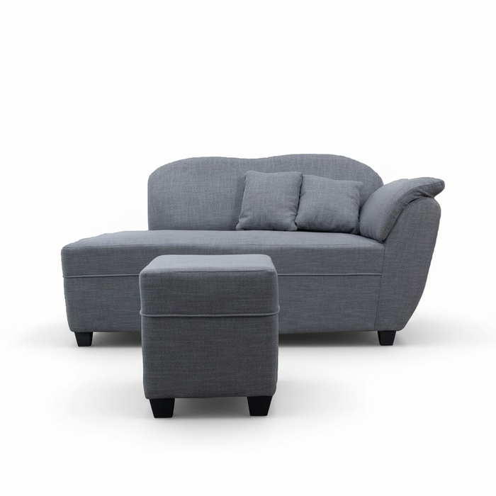 Gray upholstered 2-seater sofa with curved arms and three back cushions