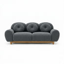 3-seater sofa with dark gray tufted back and rounded arms, wooden legs