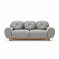 3-seater sofa with light gray tufted back, rounded arms, and wooden legs