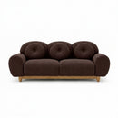 3-seater sofa with dark brown tufted back and rounded arms, wooden legs