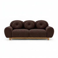 3-seater sofa with dark brown tufted back and rounded arms, wooden legs