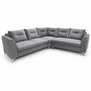 Gray L-shaped sectional sofa with tufted cushions and cushioned arms, four tapered legs