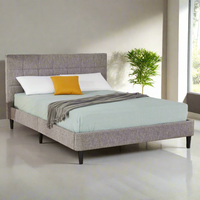 MONACO queen bed with gray headboard, light aqua cover, white and yellow pillows, gray throw