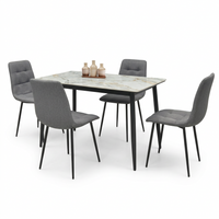 ELARA dining set by HOME SUITE, angled view of the marble-look table and four gray chairs.