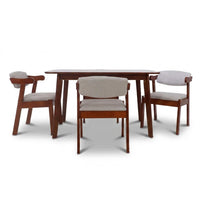 Dining table set with four chairs on a white background