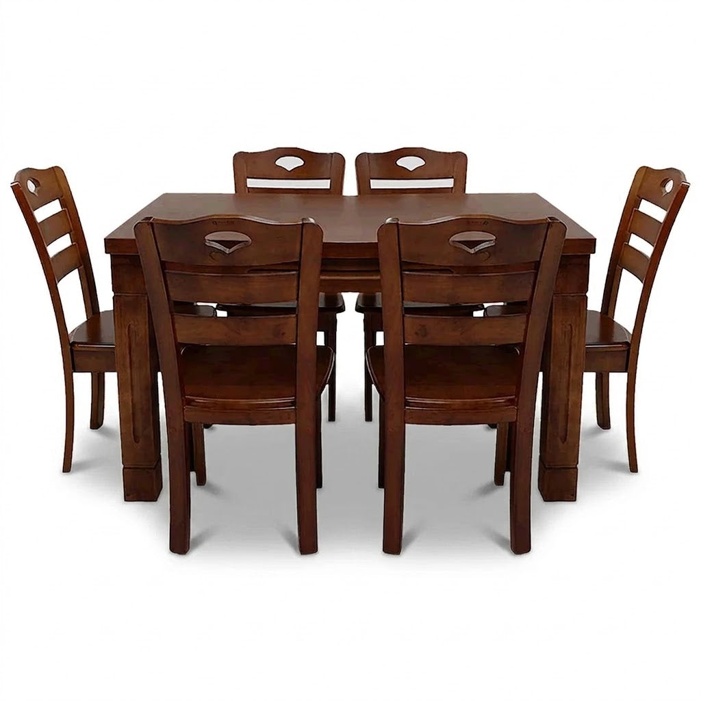 Wooden dining table set with six chairs on a white background