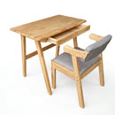 Natural wood study desk with side chair; gray upholstered seat and back