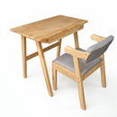 Natural wood study desk with side chair; gray cushion and light wood armrests