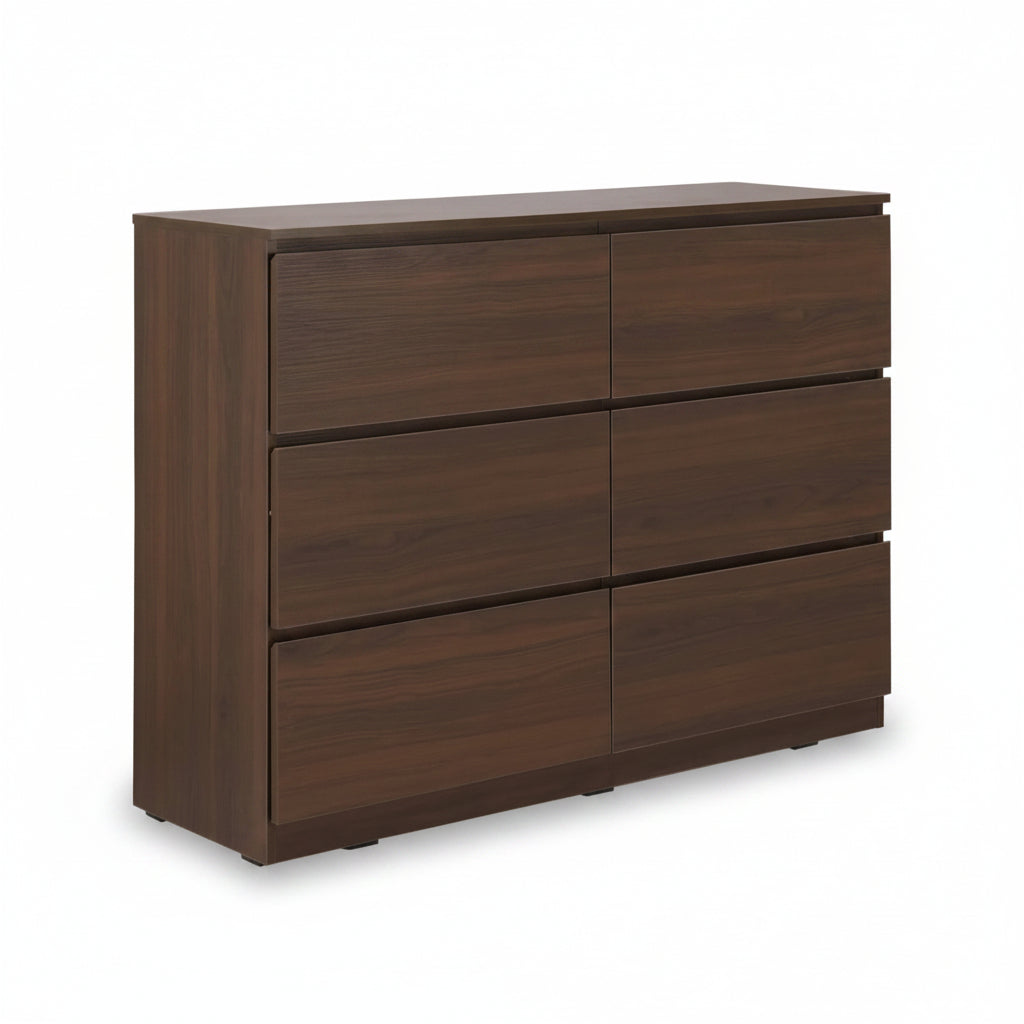 Wooden dresser with six drawers on a white background